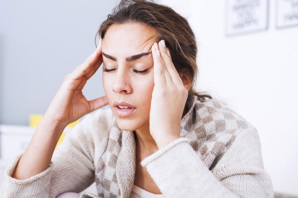 What are the treatment options for different types of headaches